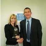 Arrow marketing manager Joan Coleman and Atmel distribution sales manager Adrian Elms with the European award